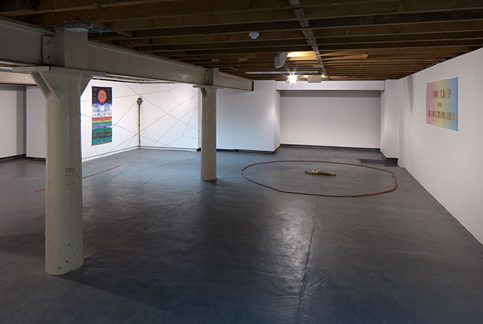 documentation photo of basement containing various objects for a low ropes course workshop