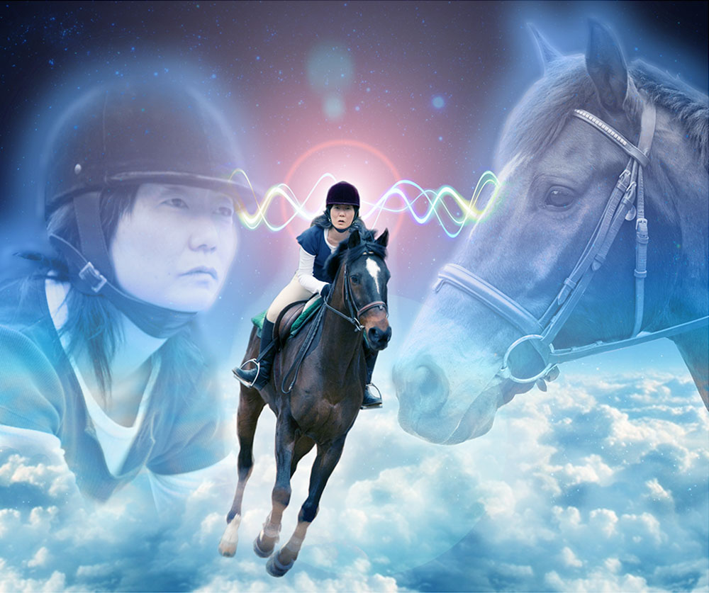 photograph of Jennifer Moon riding a horse, Beau, atop clouds in outer space with giant apparitions of Jennifer's and Beau's heads floating in the background connected by psychic waves
